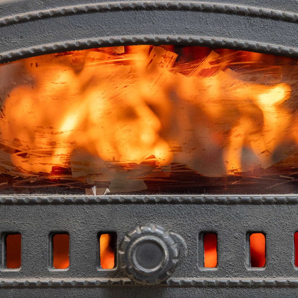 Flames roaring inside the wood-fired oven