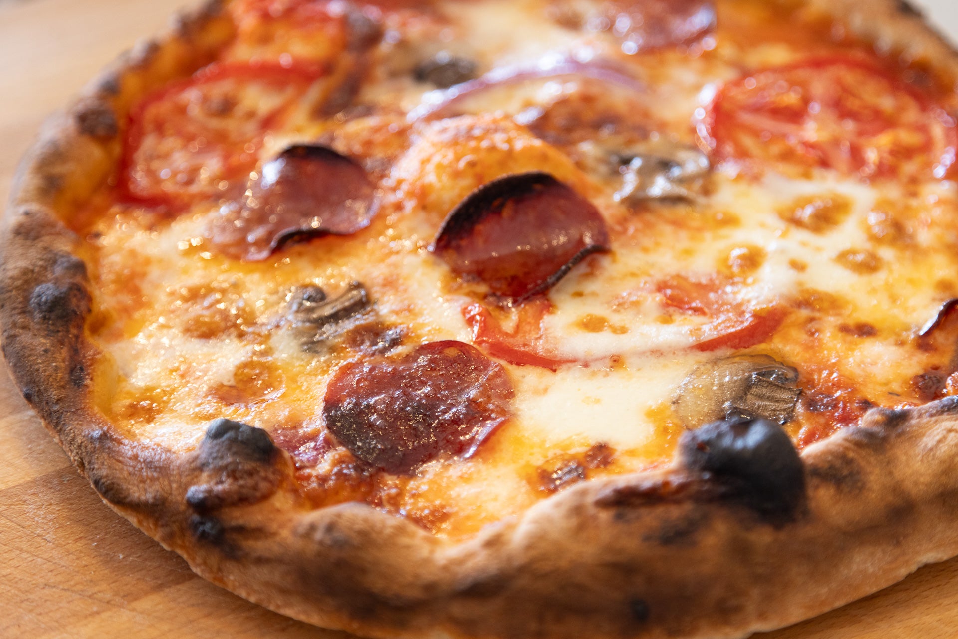 Wood-fired pizza on a tray